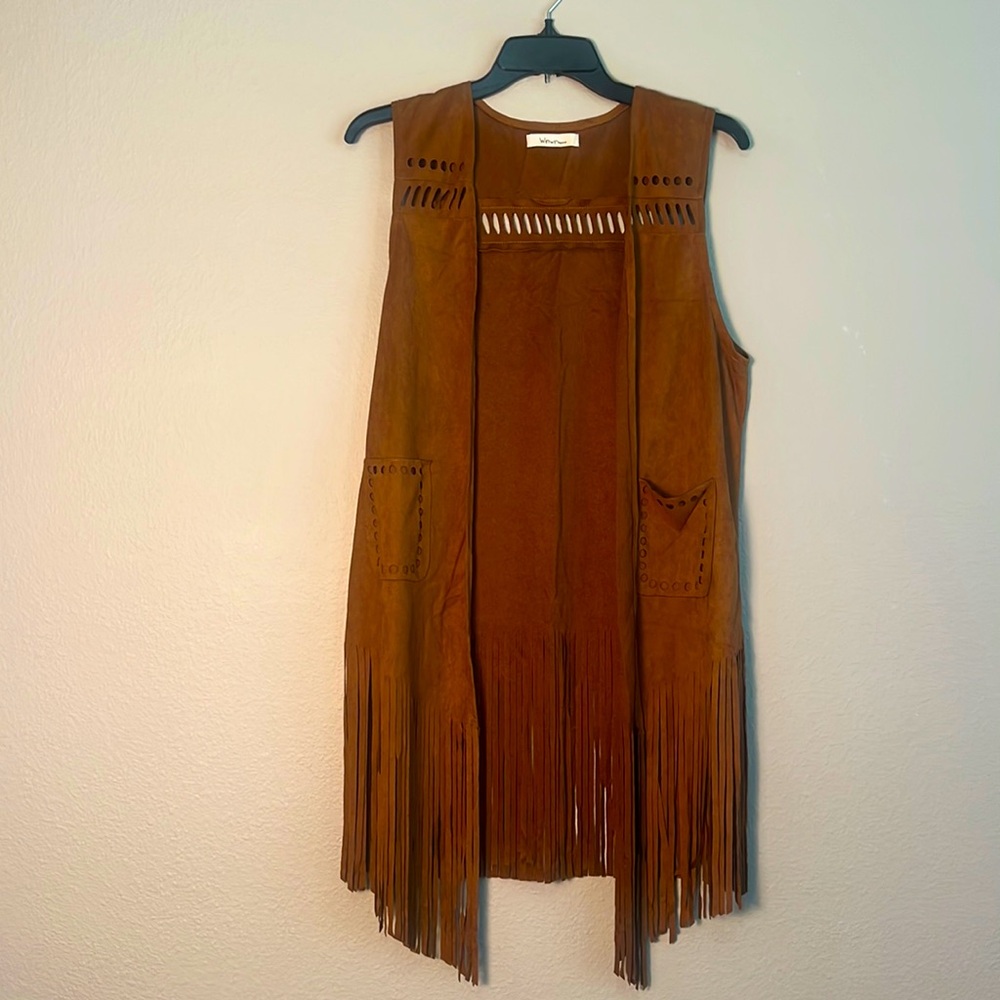 A bohemian style fringe women vest